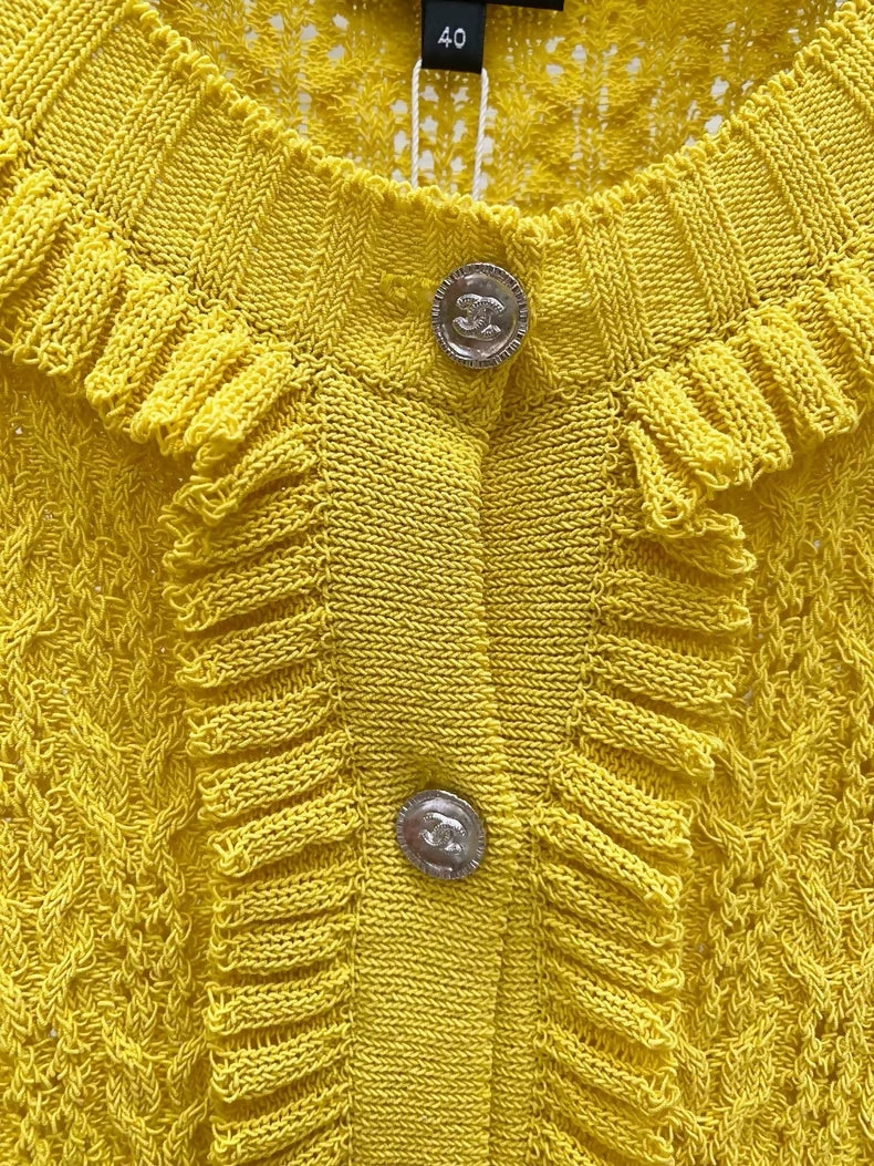 Chanel 25C yellow cardigan with ruffles