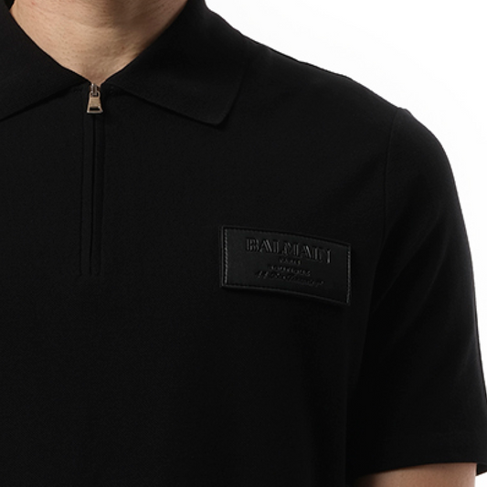 Small Leather Couture Label Zipped Polo in Black