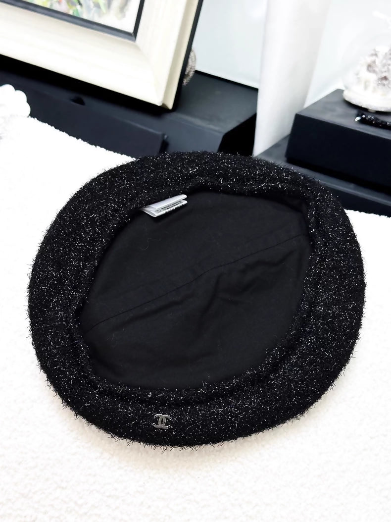 Chanel 21B black beret with silver shimmer and double C logo