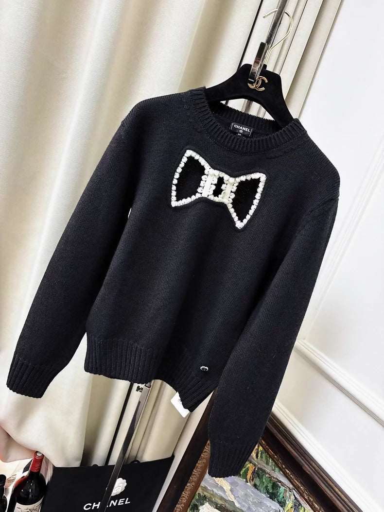 Chanel 25k black bow top