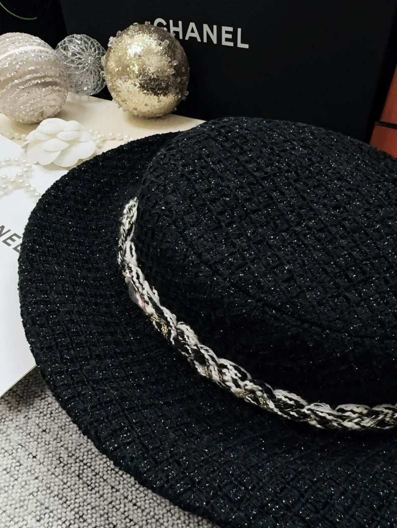Chanel 25K black tweed hat with gold trim