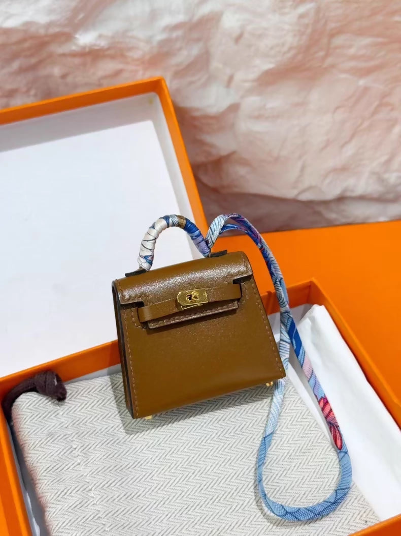 Hermes Kelly bag in tafelakt leather with Twilly bag charm
