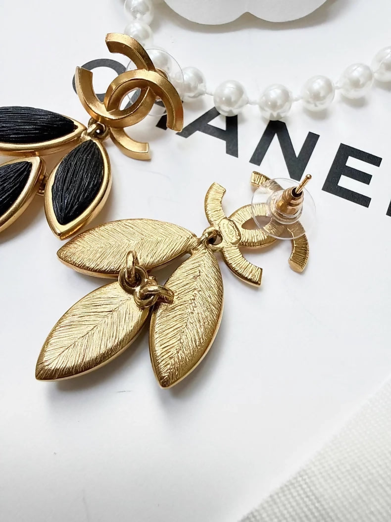 Chanel 20A Black and Gold Leaf Earrings with Double C Design