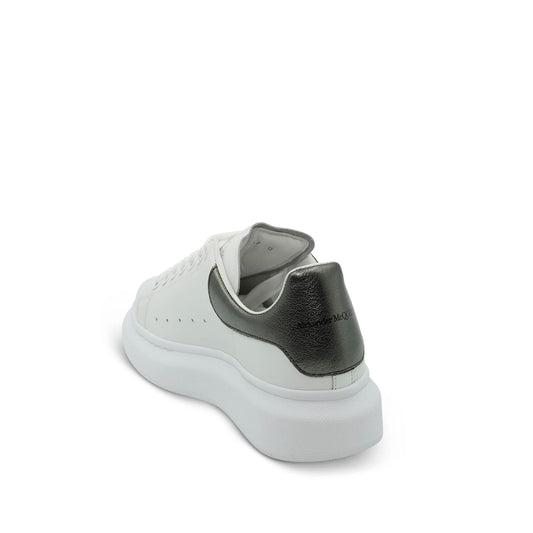 Larry Oversized Metallic Heel Sneakers in White/Black