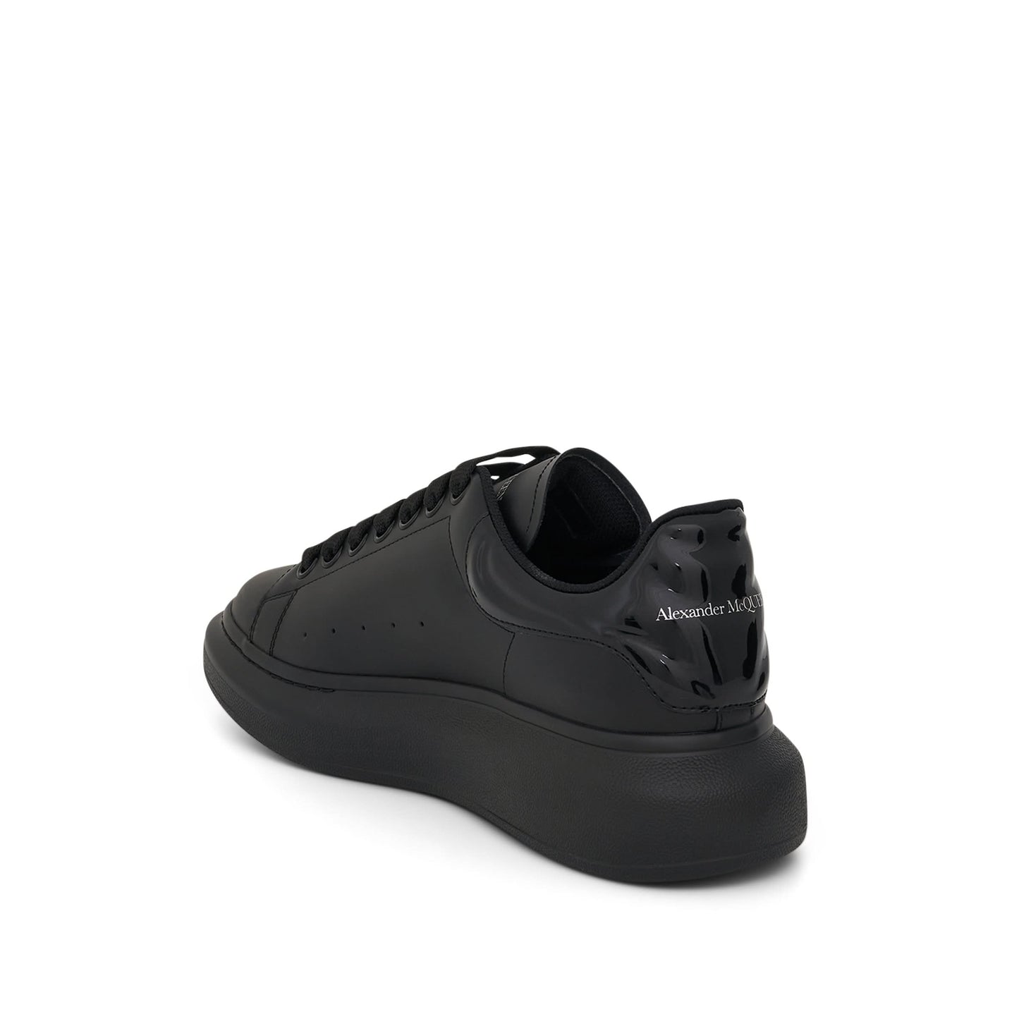 Larry Oversized Heel Sneaker in Black/Black