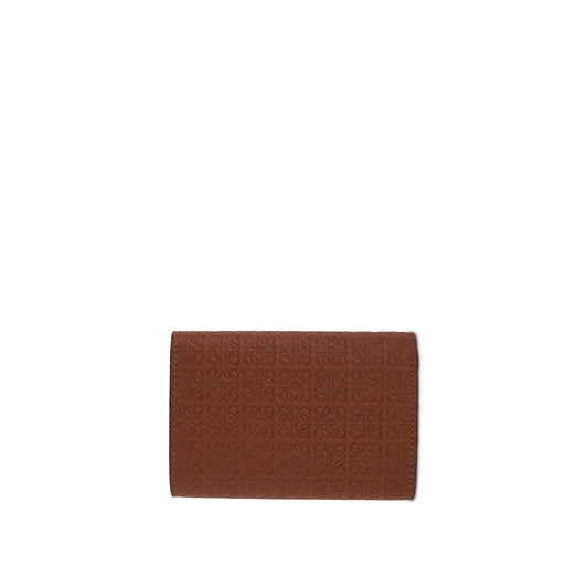 Repeat Small Vertical Wallet in Embossed Calf Leather in Tan