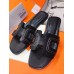 Hermes Oran Sandals In Black Leather With Stitched Detail